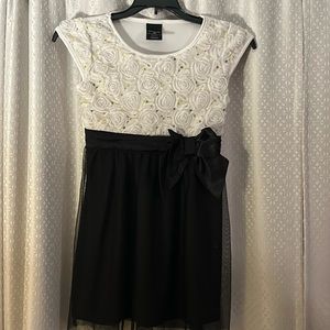black/white formal dress; flower embellished bodice; black skirt/chiffon overlay